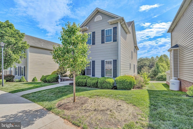 view of front of home with a front yard