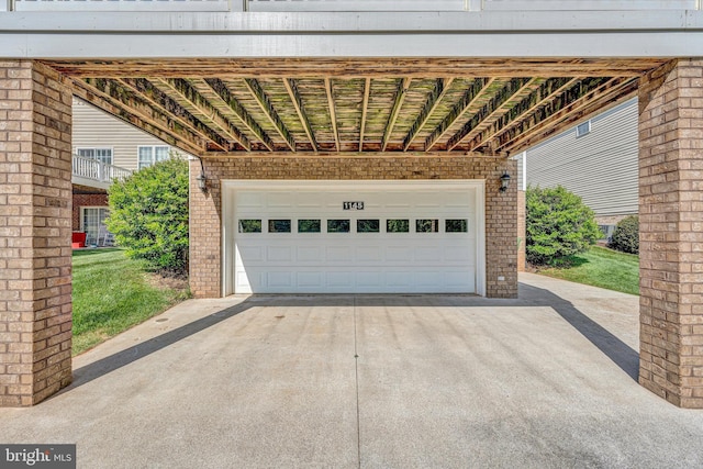 garage featuring driveway