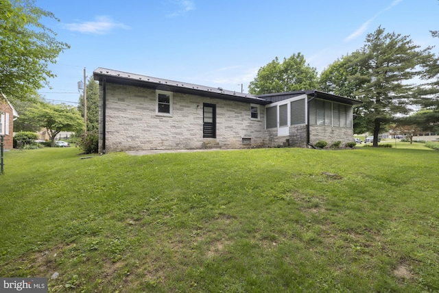 1004 Marietta Ave, Hanover, PA 17331 - rear view of property featuring stone siding and a yard