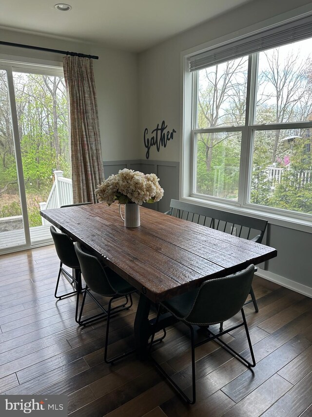 dining area with a healthy amount of sunlight, recessed lighting, and dark wood-style flooring