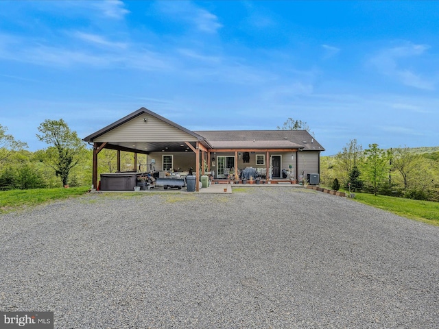 749 Poland Hollow Rd, Romney, WV 26757 - view of front of home featuring gravel driveway, central AC unit, and a hot tub