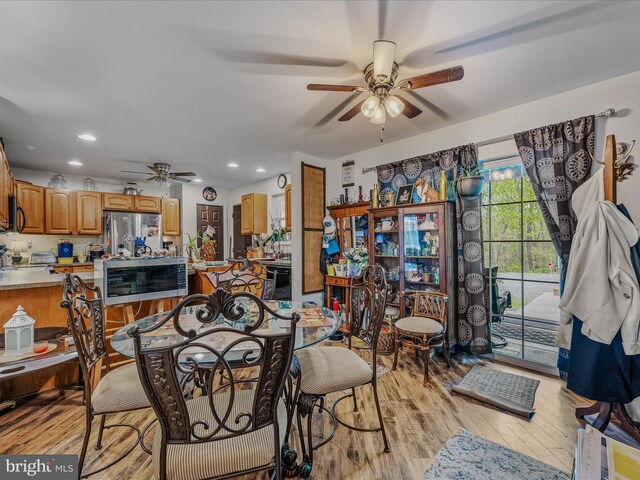 749 Poland Hollow Rd, Romney, WV 26757 - dining room with light wood-style floors, a ceiling fan, and recessed lighting