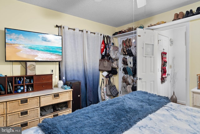 bedroom featuring a textured ceiling