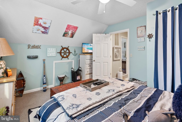 bedroom with carpet flooring, a ceiling fan, baseboards, and vaulted ceiling