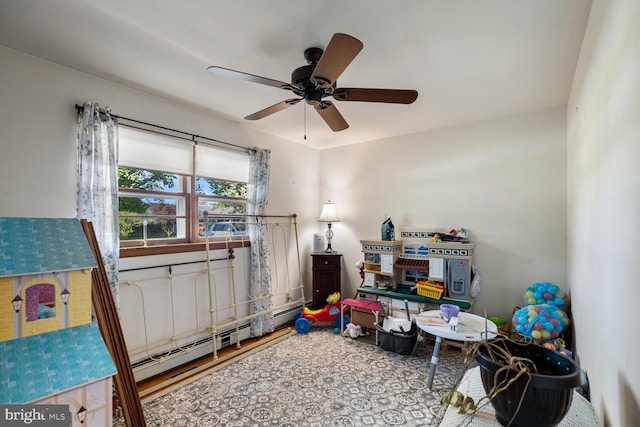 196 Taylortown Rd, Edinburg, VA 22824 - rec room with a baseboard radiator and a ceiling fan