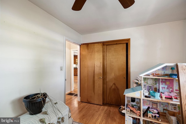 196 Taylortown Rd, Edinburg, VA 22824 - bedroom with wood finished floors, a closet, and ceiling fan
