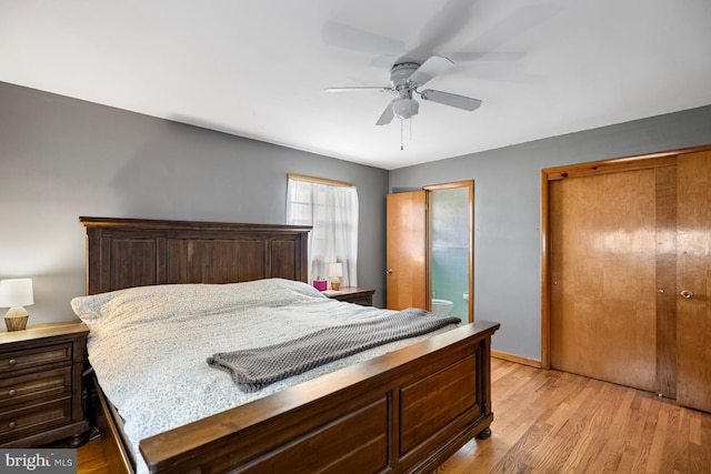 196 Taylortown Rd, Edinburg, VA 22824 - bedroom featuring light wood finished floors, ceiling fan, baseboards, and ensuite bathroom