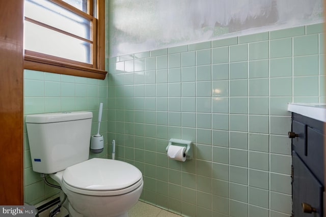 196 Taylortown Rd, Edinburg, VA 22824 - half bath with tile walls, plenty of natural light, toilet, and vanity