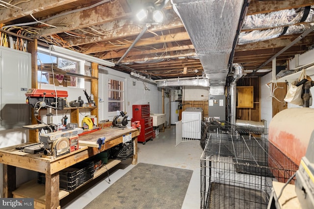 196 Taylortown Rd, Edinburg, VA 22824 - basement with a workshop area, water heater, and washer / clothes dryer