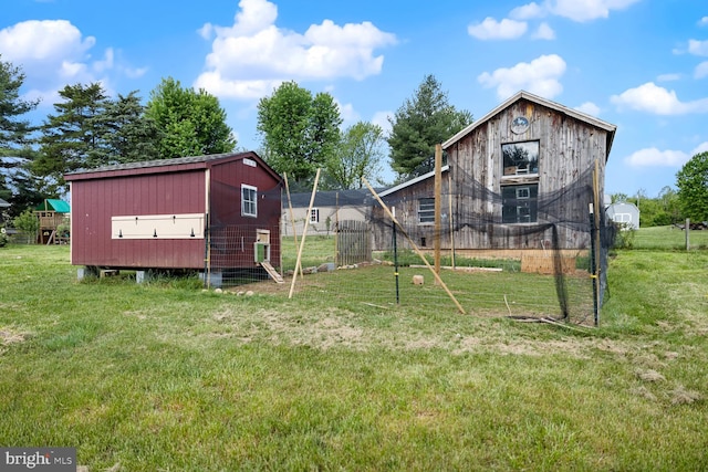 196 Taylortown Rd, Edinburg, VA 22824 - view of green lawn featuring an outbuilding, exterior structure, and a barn