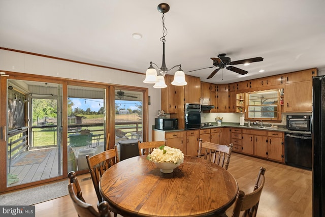 196 Taylortown Rd, Edinburg, VA 22824 - dining area with a ceiling fan, light wood-style flooring, a chandelier, and recessed lighting