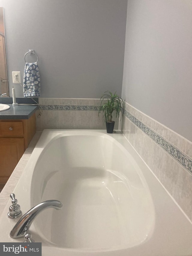room details with vanity and a bath