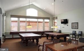 rec room with baseboards, billiards, a healthy amount of sunlight, and high vaulted ceiling