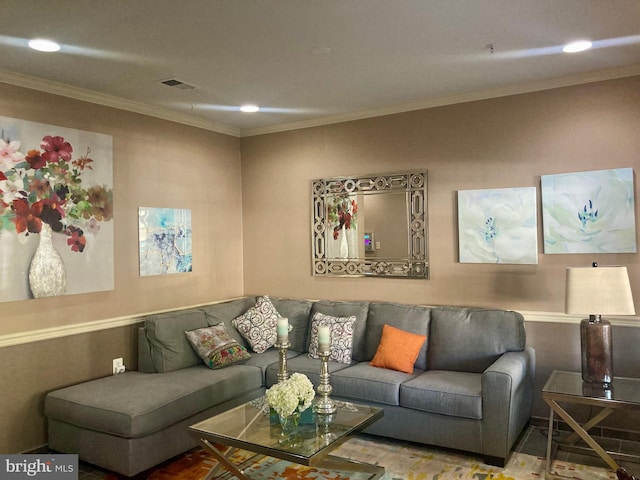 living room featuring crown molding, recessed lighting, and visible vents