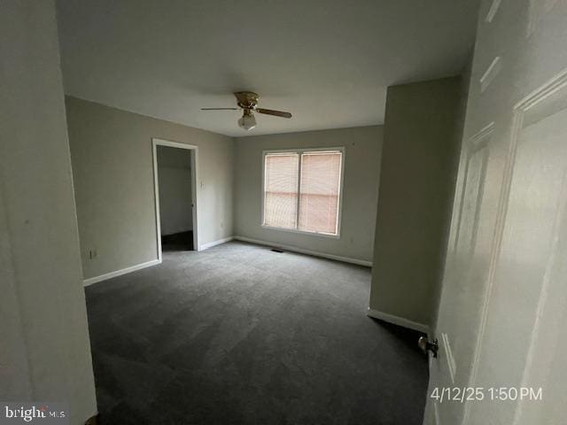 unfurnished bedroom featuring baseboards, carpet flooring, and ceiling fan