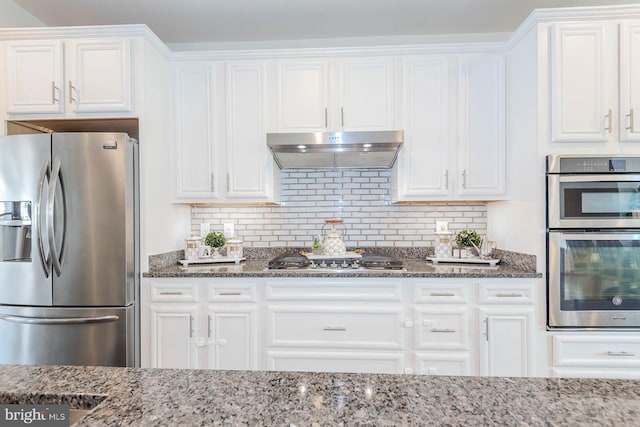 kitchen featuring stainless steel appliances and white cabinetry