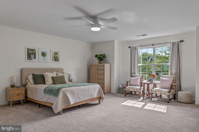 bedroom with carpet, baseboards, and ceiling fan