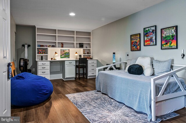 bedroom featuring dark wood finished floors, a desk, and recessed lighting