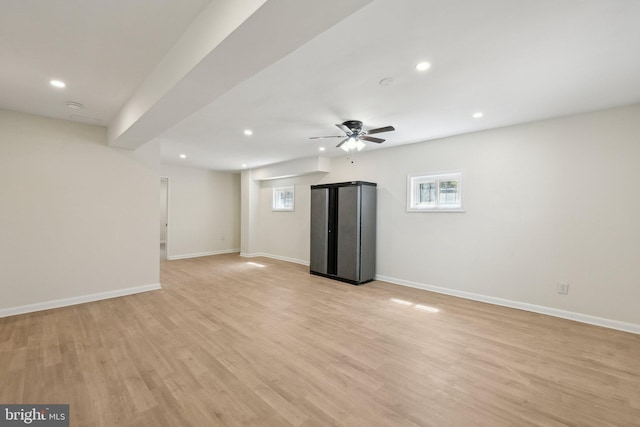interior space with plenty of natural light, light wood-type flooring, a ceiling fan, and recessed lighting
