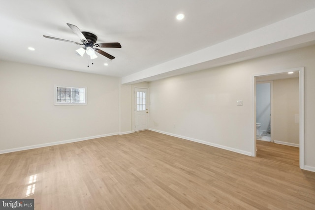 interior space featuring baseboards, ceiling fan, light wood finished floors, and recessed lighting