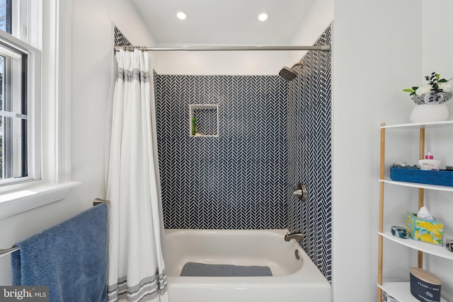 bathroom featuring shower / bath combo and recessed lighting