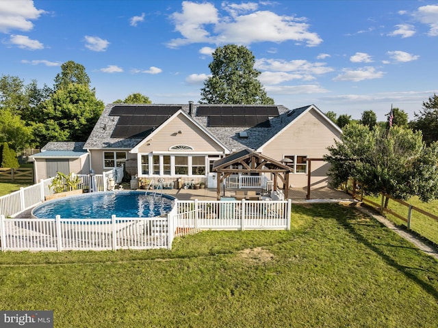 373 Thunder Hill Dr, Summit Point, WV 25446 - rear view of house with roof mounted solar panels, a gazebo, and a wooden deck