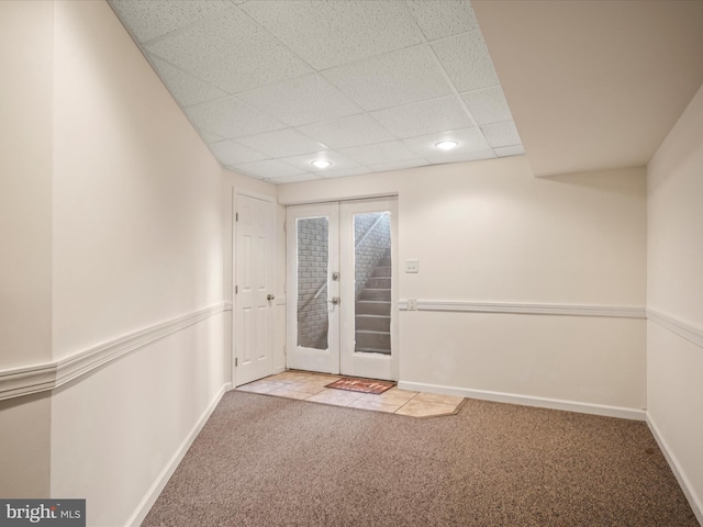 373 Thunder Hill Dr, Summit Point, WV 25446 - empty room featuring carpet floors, french doors, a drop ceiling, baseboards, and recessed lighting