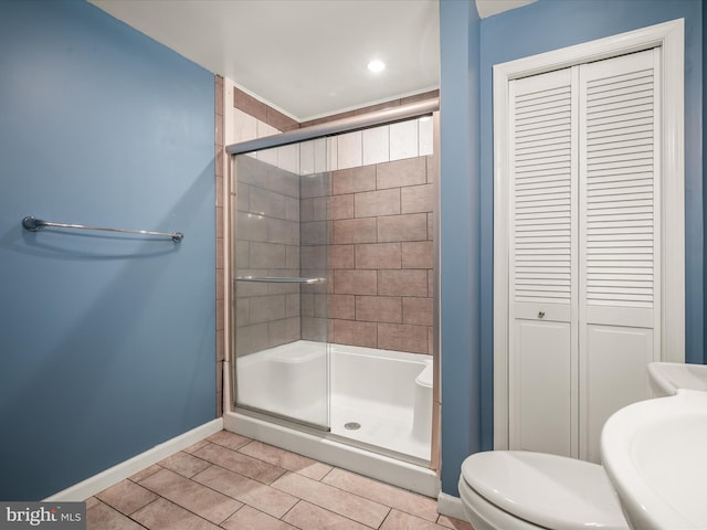 373 Thunder Hill Dr, Summit Point, WV 25446 - full bath featuring a closet, a stall shower, toilet, baseboards, and tile patterned floors