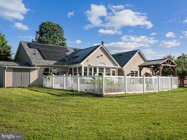 373 Thunder Hill Dr, Summit Point, WV 25446 - rear view of house featuring a gazebo, a sunroom, and roof mounted solar panels