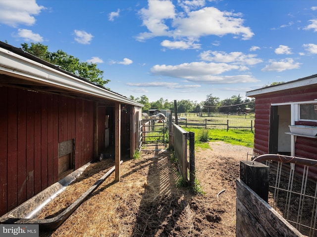 373 Thunder Hill Dr, Summit Point, WV 25446 - view of yard with an exterior structure, a view of rural / pastoral area, and an outdoor structure