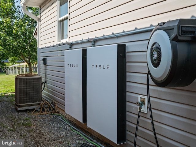 373 Thunder Hill Dr, Summit Point, WV 25446 - exterior view of a power storage unit and central air condition unit