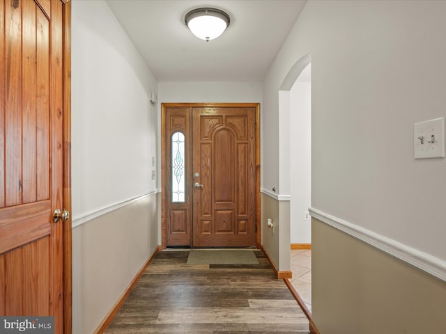 373 Thunder Hill Dr, Summit Point, WV 25446 - foyer entrance with arched walkways, light wood-style floors, and baseboards