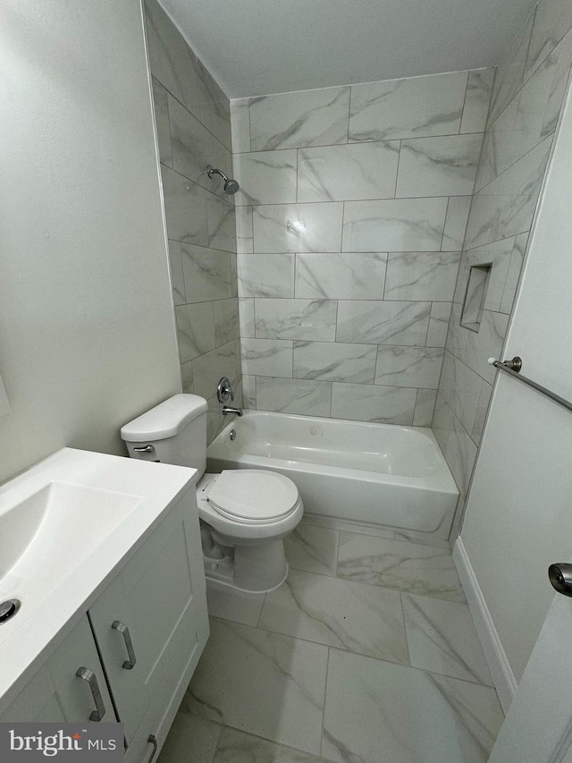 full bathroom with shower / tub combination, vanity, toilet, marble finish floor, and baseboards