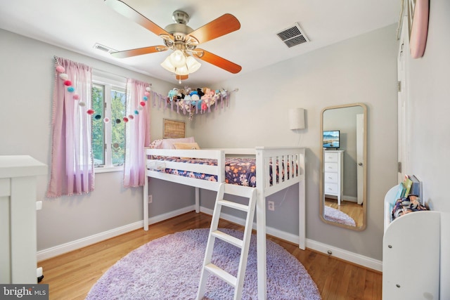 7925 Belhaven Ave, Pasadena, MD 21122 - bedroom featuring wood finished floors, baseboards, and ceiling fan