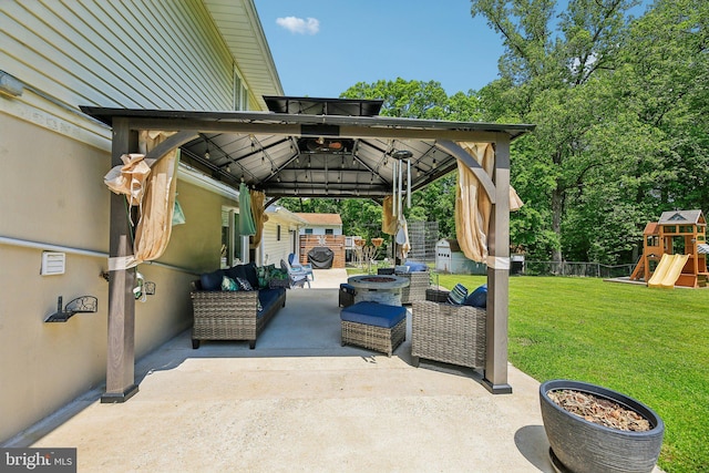7925 Belhaven Ave, Pasadena, MD 21122 - view of patio with a playground, a gazebo, and an outdoor living space with a fire pit