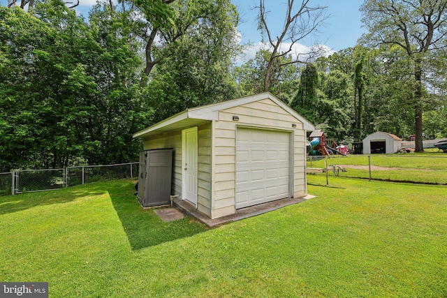 7925 Belhaven Ave, Pasadena, MD 21122 - view of shed featuring a playground, view of scattered trees, and driveway