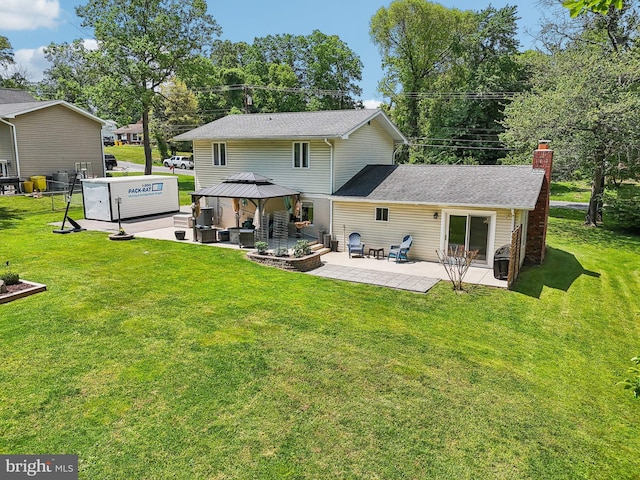 7925 Belhaven Ave, Pasadena, MD 21122 - back of property with a gazebo, a patio, a chimney, and a lawn