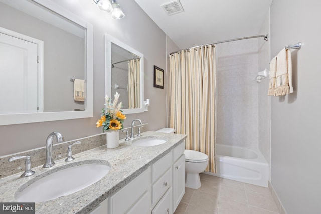 bathroom with tile patterned flooring, toilet, shower / tub combo, and double vanity