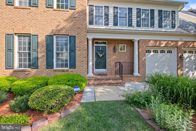entrance to property with brick siding