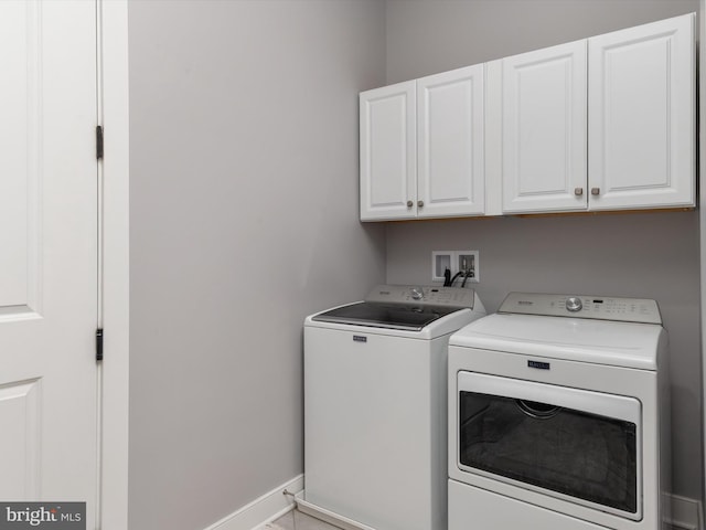 1513 Yellow Sand Ln, Odenton, MD 21113 - laundry area featuring cabinet space, washer and clothes dryer, and baseboards