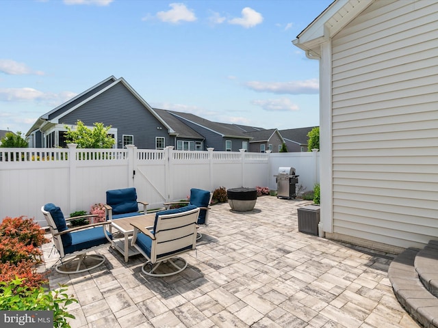 1513 Yellow Sand Ln, Odenton, MD 21113 - fenced backyard with a patio, area for grilling, and a gate