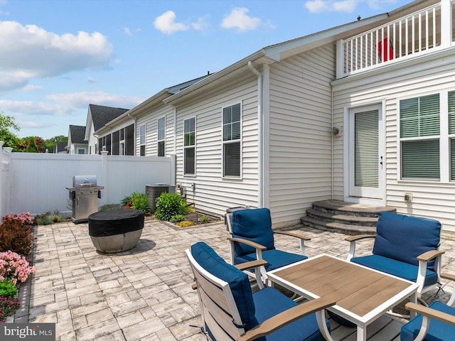 1513 Yellow Sand Ln, Odenton, MD 21113 - view of patio with grilling area, a fire pit, and cooling unit