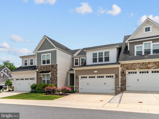 1513 Yellow Sand Ln, Odenton, MD 21113 - craftsman-style house with stone siding, driveway, board and batten siding, and a garage