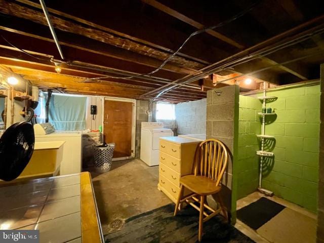 basement featuring washer and clothes dryer