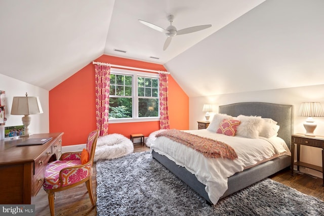 bedroom with wood finished floors, a ceiling fan, and vaulted ceiling