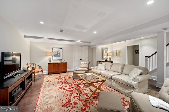 living room with recessed lighting, baseboards, stairway, and wood finished floors