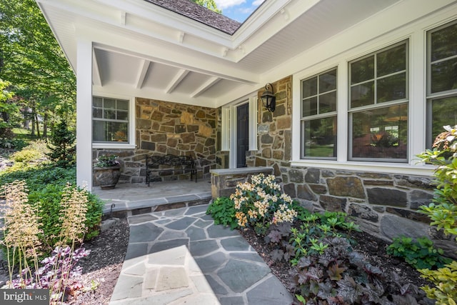 1660 Mount Pleasant Rd, Villanova, PA 19085 - exterior space with covered porch and stone siding