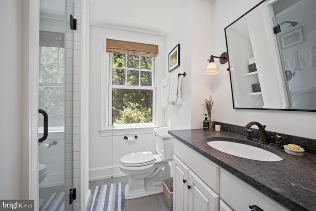 1660 Mount Pleasant Rd, Villanova, PA 19085 - bathroom with toilet, baseboards, vanity, and a shower stall