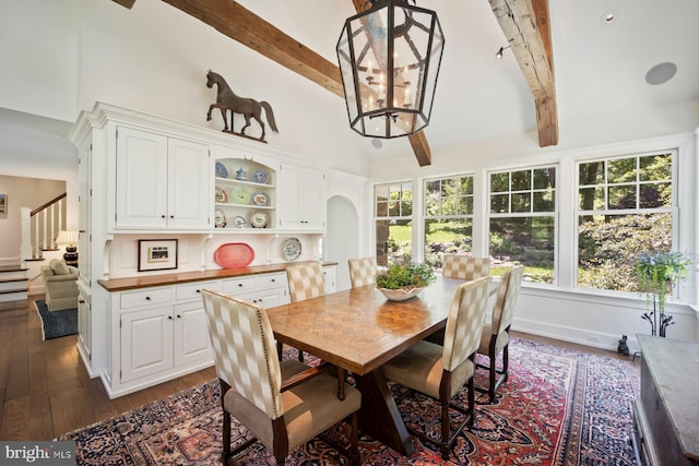 1660 Mount Pleasant Rd, Villanova, PA 19085 - dining area with beamed ceiling, stairway, dark wood finished floors, and high vaulted ceiling