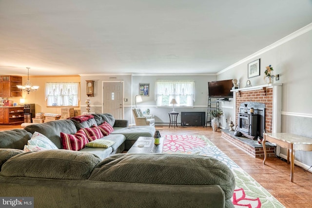 14957 Cherry Ln, Ridgely, MD 21660 - living room featuring plenty of natural light, ornamental molding, a chandelier, wood finished floors, and a baseboard heating unit